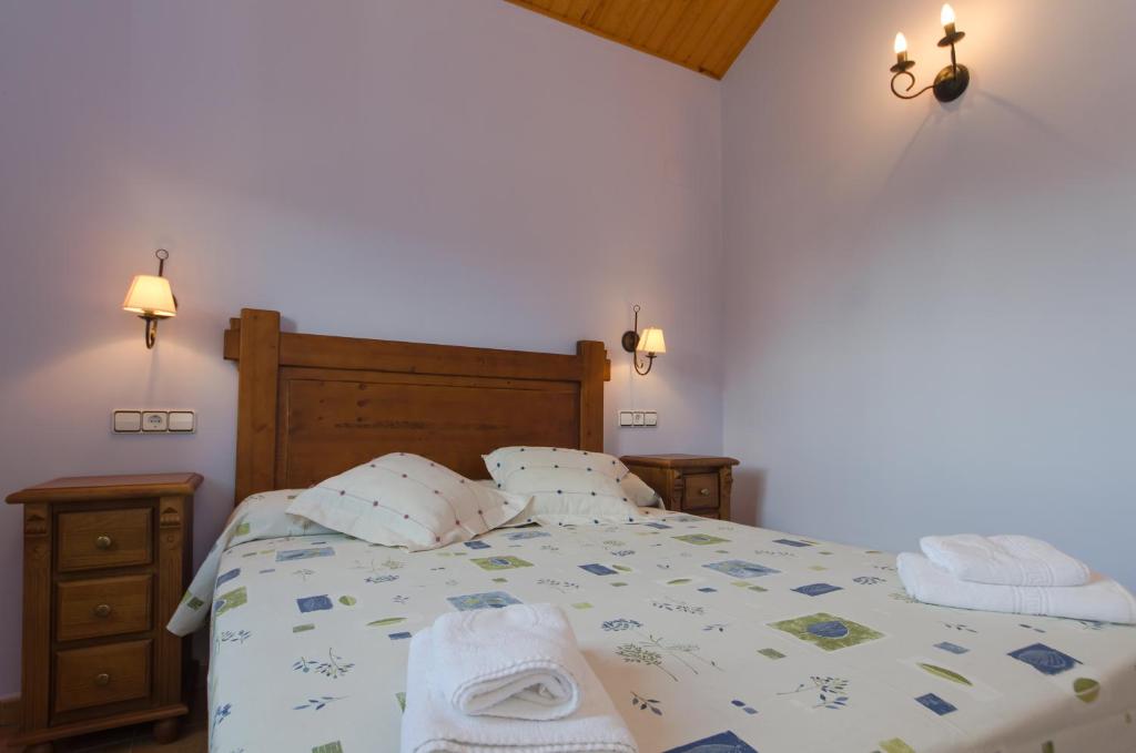 Postel nebo postele na pokoji v ubytování Casa Soltero Apartamentos