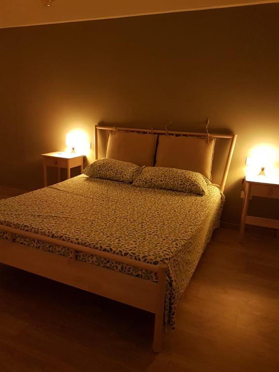 Łóżko lub łóżka w pokoju w obiekcie Agriturismo La Costa dei Trabocchi