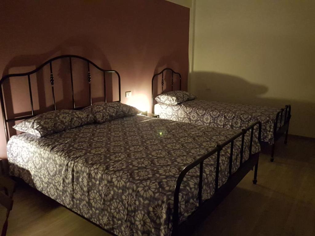 Łóżko lub łóżka w pokoju w obiekcie Agriturismo La Costa dei Trabocchi