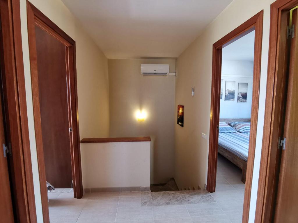 Postel nebo postele na pokoji v ubytování Casa Dorada
