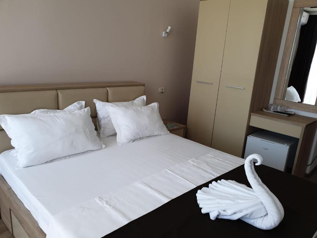 Postel nebo postele na pokoji v ubytování Hotel Solea Beach