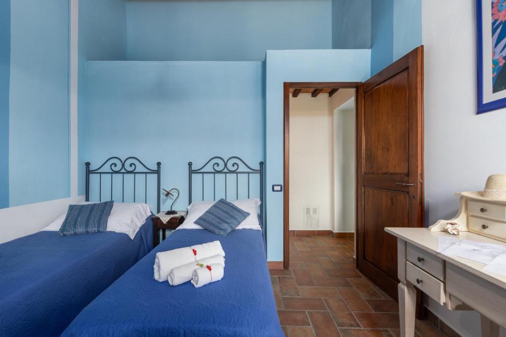 Postel nebo postele na pokoji v ubytování Linearis Holiday House
