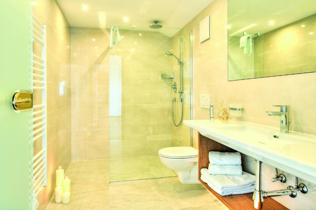 Koupelna v ubytování Hotel Garni Urezza