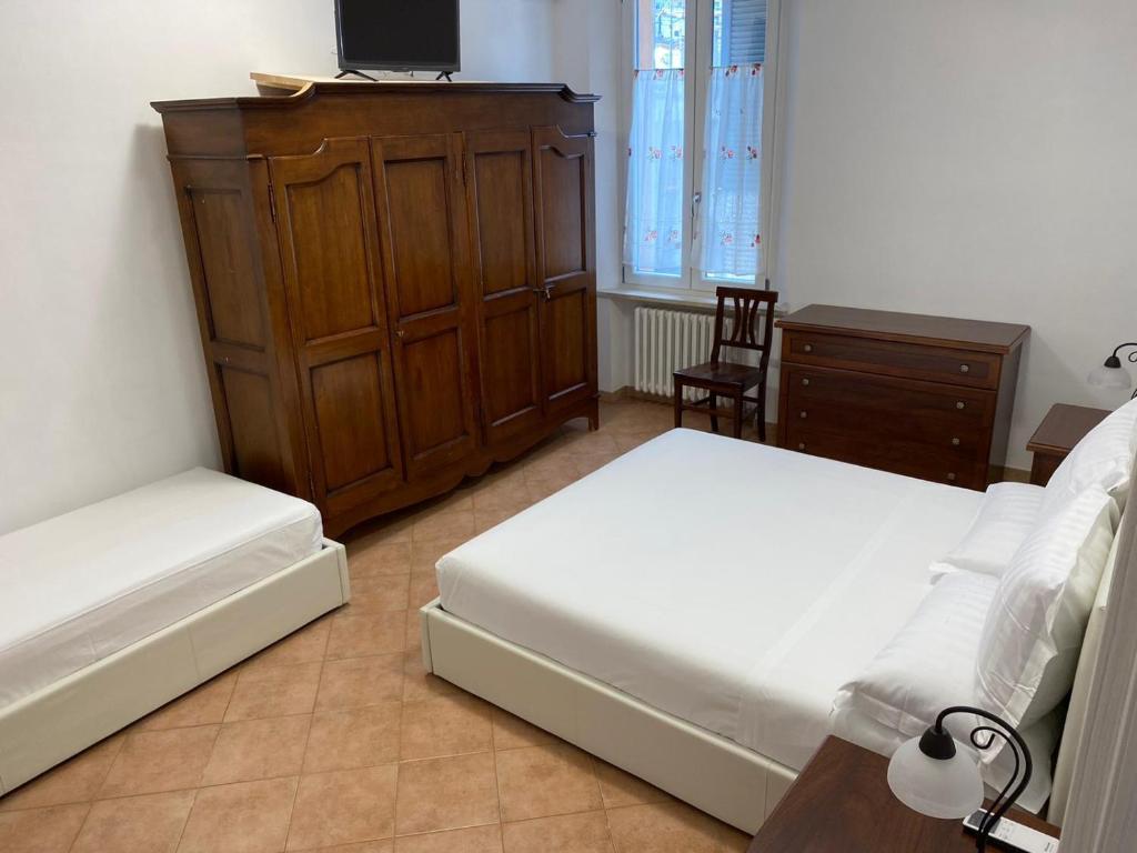 Postel nebo postele na pokoji v ubytování B&B Giulia