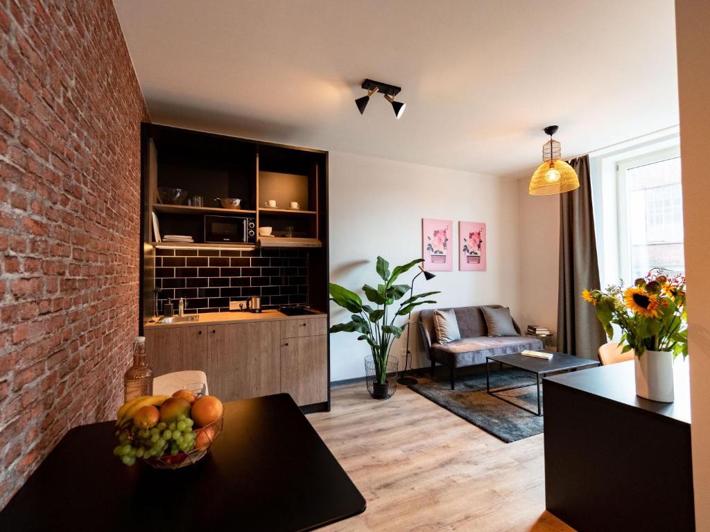Posezení v ubytování PHNX Aparthotel Hamburg