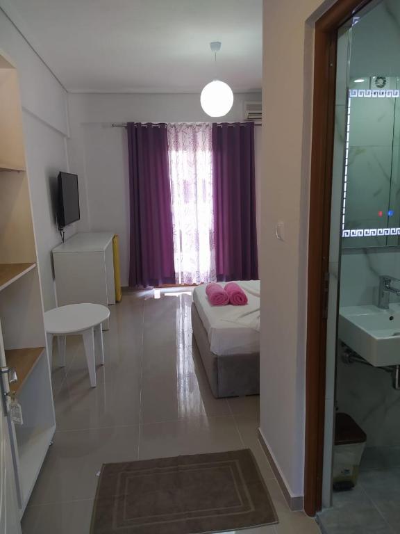 Postel nebo postele na pokoji v ubytování Hotel Elisabet
