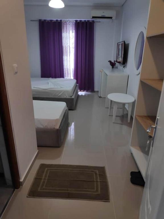Postel nebo postele na pokoji v ubytování Hotel Elisabet