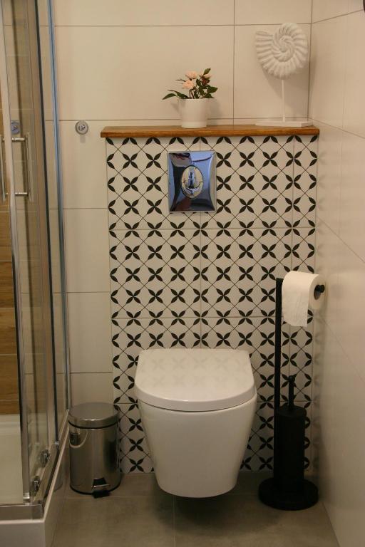Kúpeľňa v ubytovaní Apartament zielony