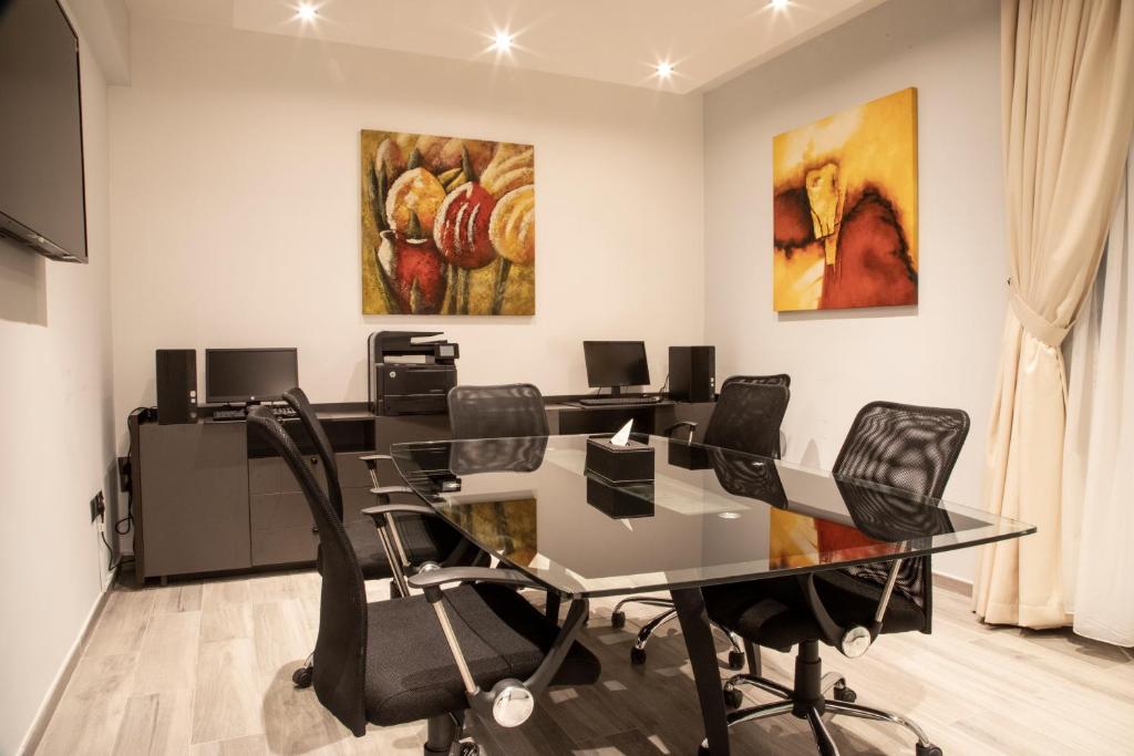TV a/nebo společenská místnost v ubytování Andalus Habitat Hotel