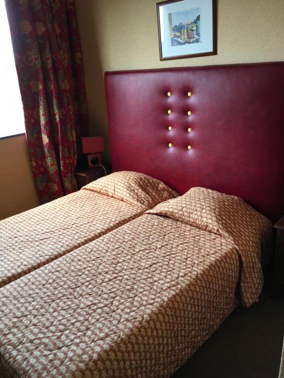 Postel nebo postele na pokoji v ubytování Hotel Dorele