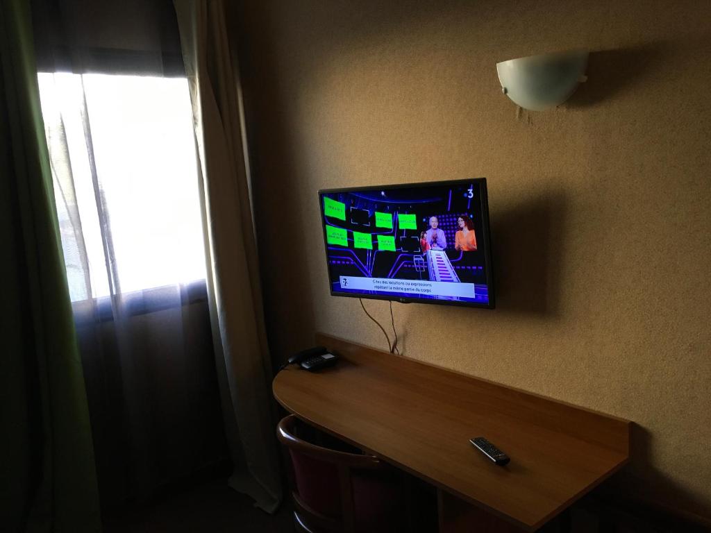 TV a/nebo společenská místnost v ubytování Hotel Dorele