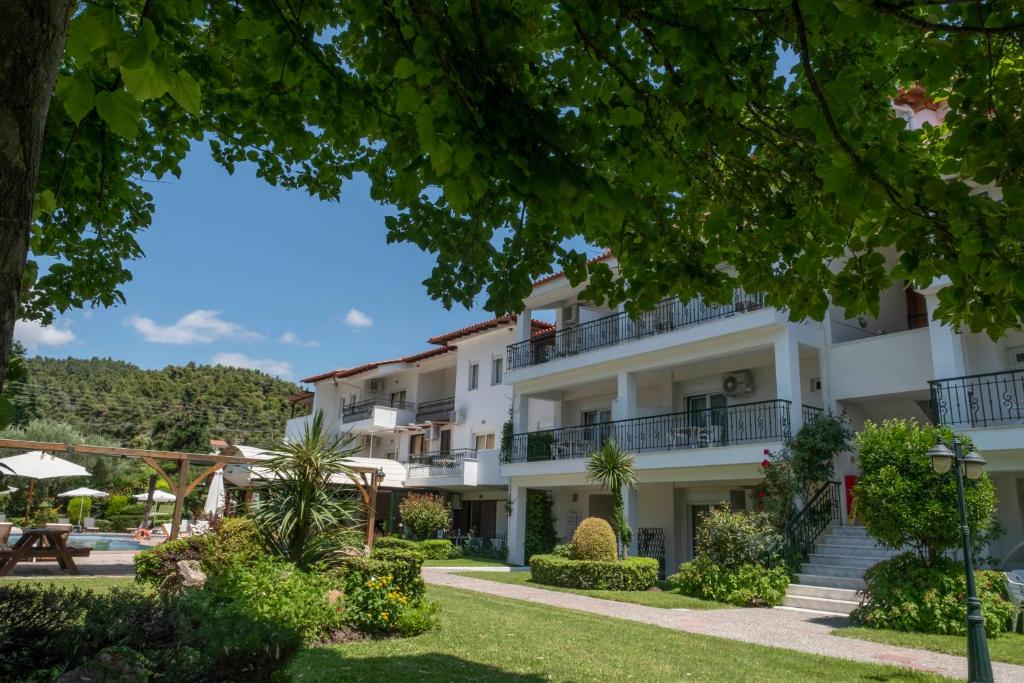 a view of the hotel from the garden at Aristides Hotel in Fourka