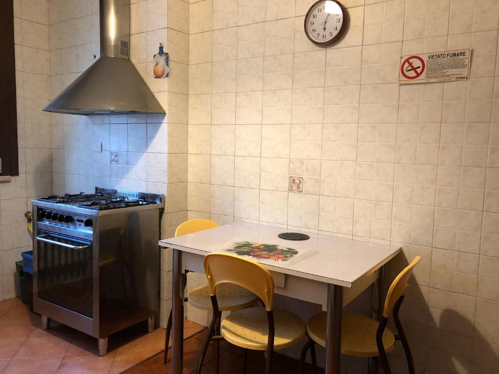 Kuchyň nebo kuchyňský kout v ubytování Alloggi Al Giardino & La Suite