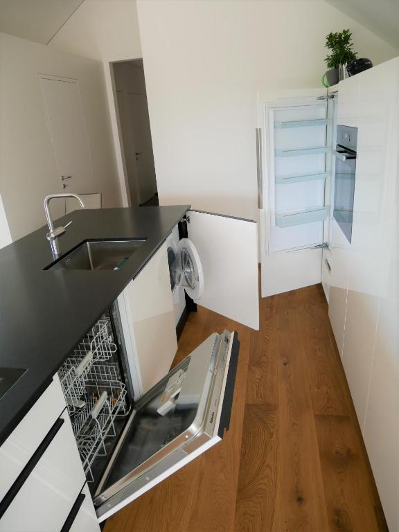 Kuchyň nebo kuchyňský kout v ubytování Penthouse 37th HEAVEN (ca. 90m²)