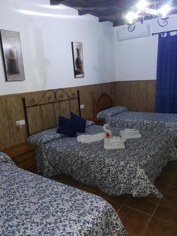 Postel nebo postele na pokoji v ubytování Hostal Breñaverde