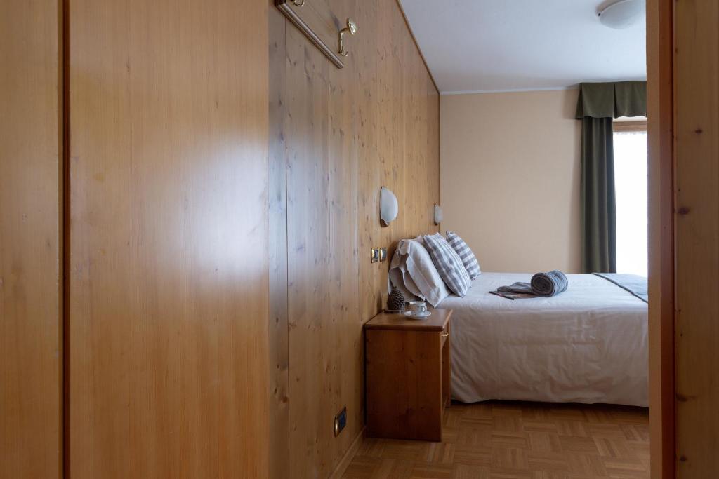 Postel nebo postele na pokoji v ubytování Hotel Cima Piazzi