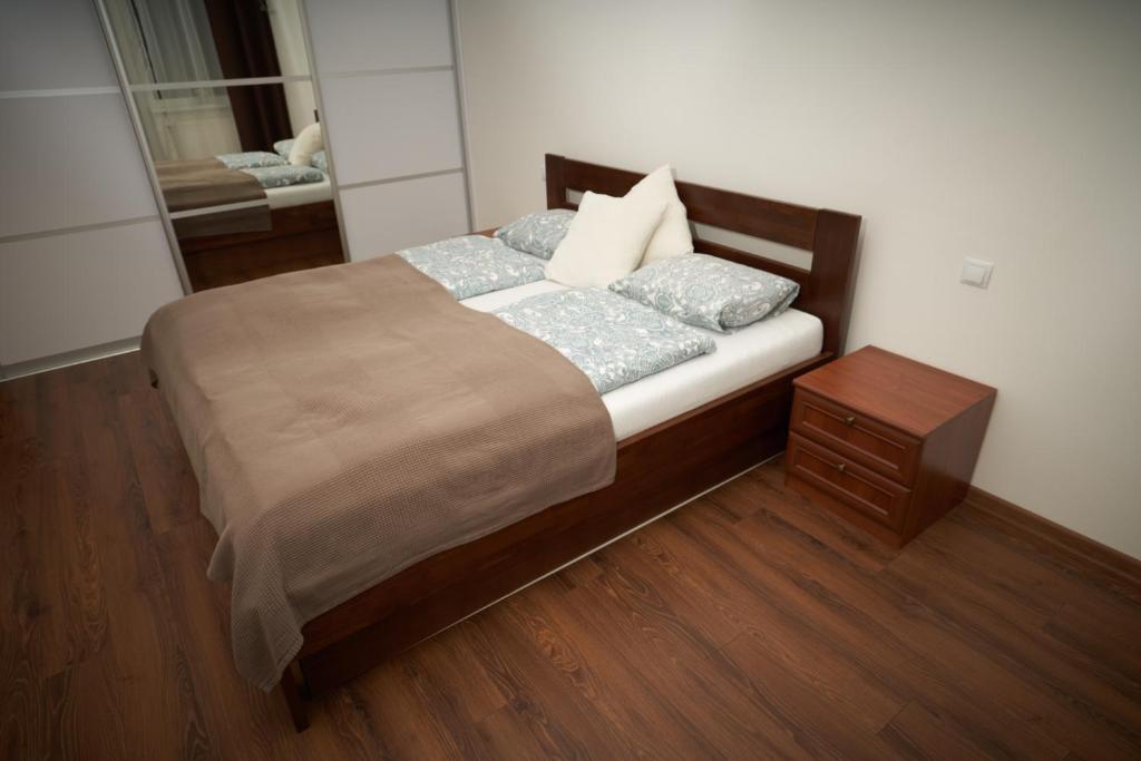 Posteľ alebo postele v izbe v ubytovaní Apartman A&M