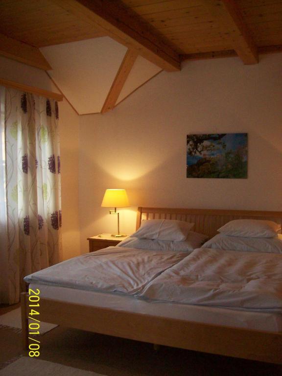Postel nebo postele na pokoji v ubytování Haus Loidl