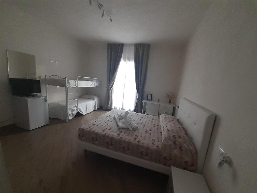 Postel nebo postele na pokoji v ubytování A casa di Vito