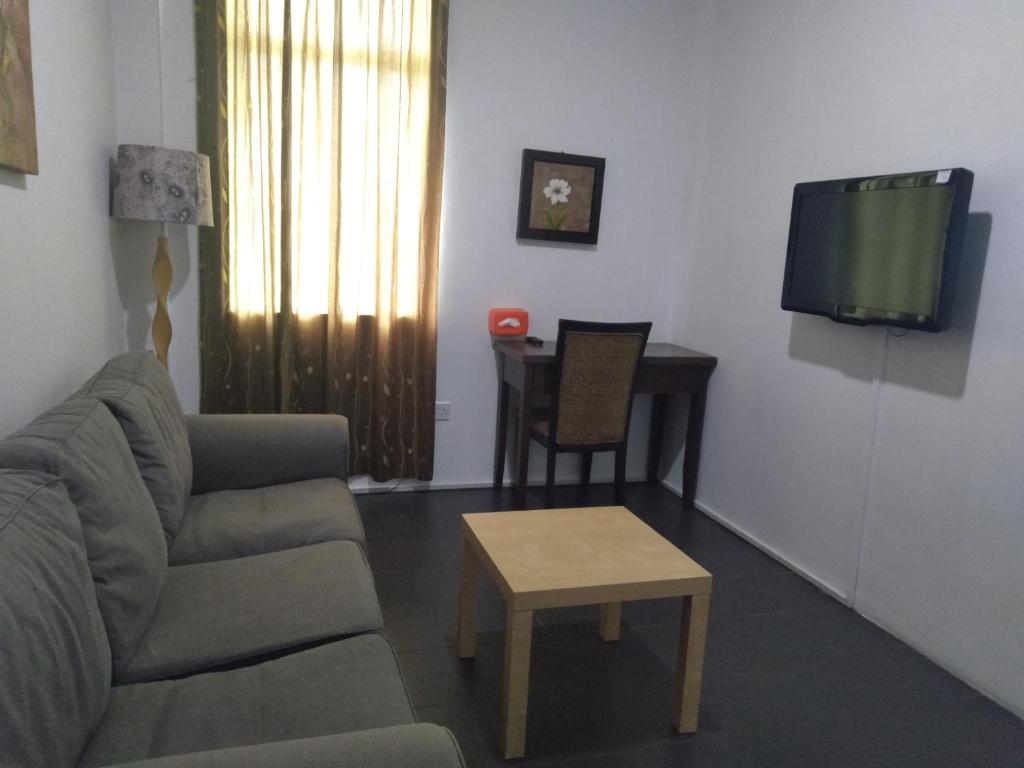 Posezení v ubytování Ginasuite Kompleks27 Hotel