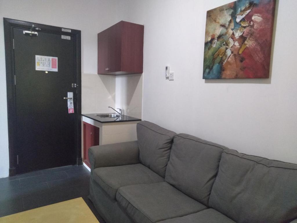 Posezení v ubytování Ginasuite Kompleks27 Hotel