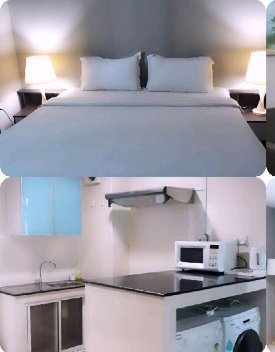 Kuchyň nebo kuchyňský kout v ubytování Ginasuite Kompleks27 Hotel