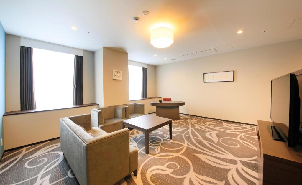 TV a/nebo společenská místnost v ubytování Quintessa Hotel Osaka Bay