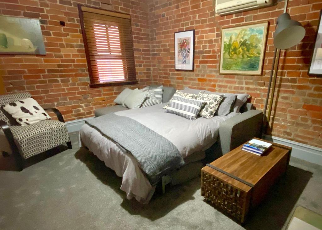 En eller flere senge i et værelse på 44 THE LANE