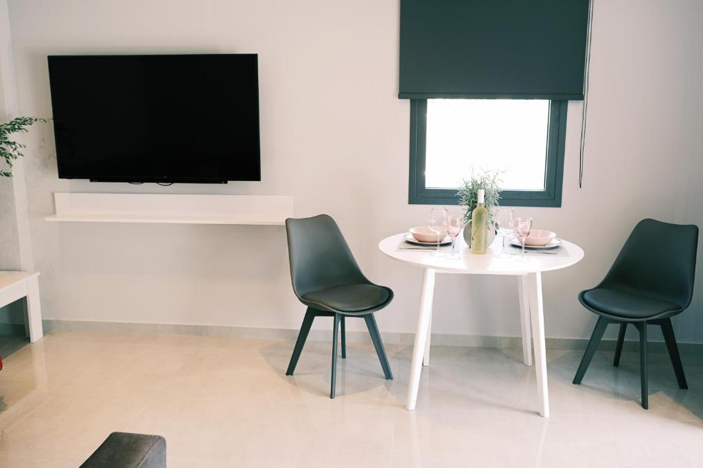 TV a/nebo společenská místnost v ubytování cobalt aqua