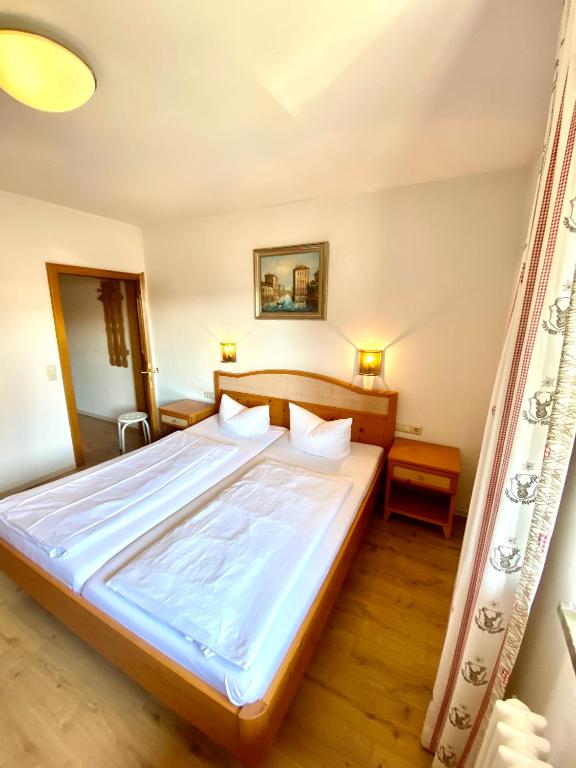 Postel nebo postele na pokoji v ubytování Gasthof-Hotel Höhensteiger