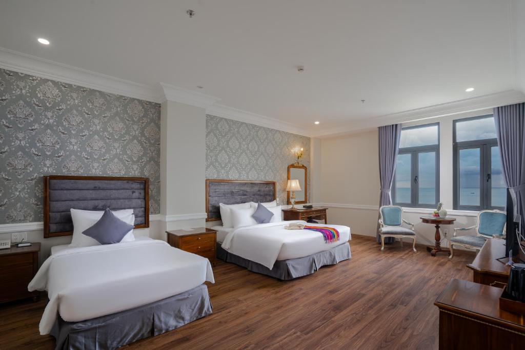 Voodi või voodid majutusasutuse AVS Hotel Phu Quoc toas