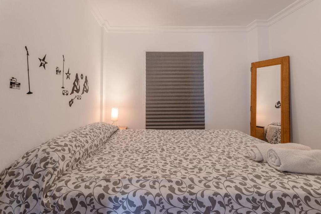 Posteľ alebo postele v izbe v ubytovaní Apartamento Valle de Abdalajis
