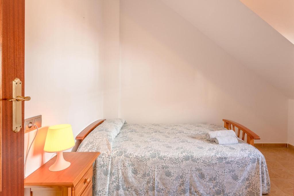 Posteľ alebo postele v izbe v ubytovaní Apartamento Valle de Abdalajis
