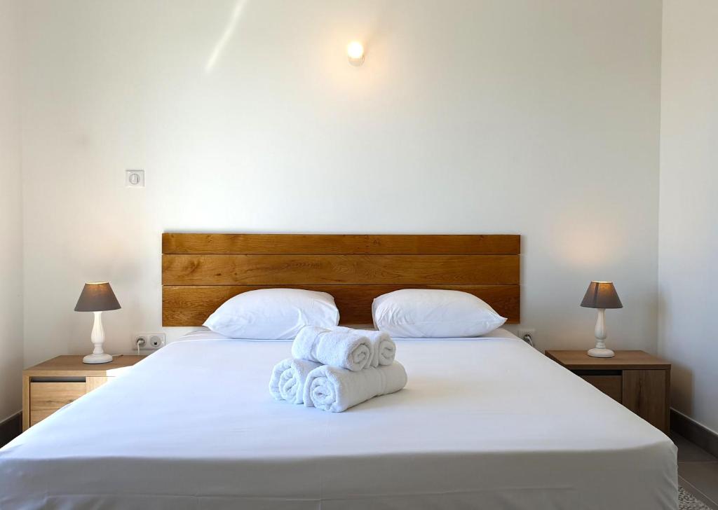 Postel nebo postele na pokoji v ubytování Appartement Etamine, l'Ermitage les Bains, proche du lagon pour 6 personnes