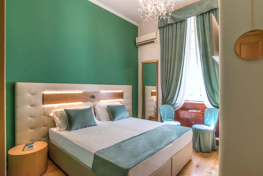 Postel nebo postele na pokoji v ubytování Hotel Paba
