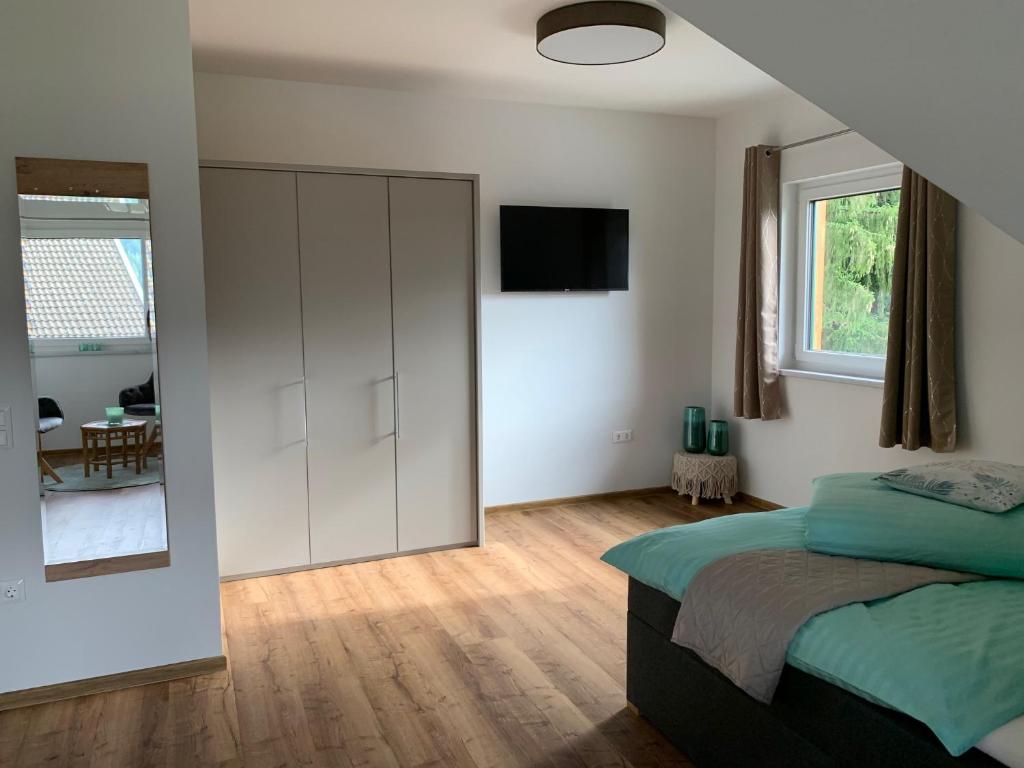 Postel nebo postele na pokoji v ubytování Ferienhaus Feil
