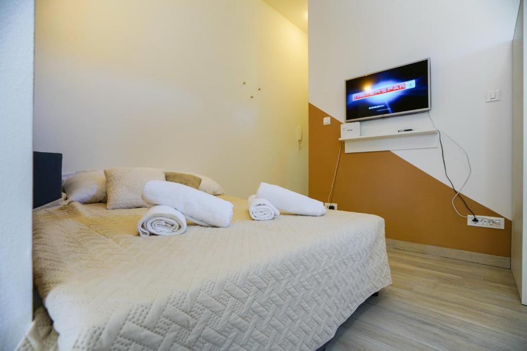 Posteľ alebo postele v izbe v ubytovaní Apartment Nicol