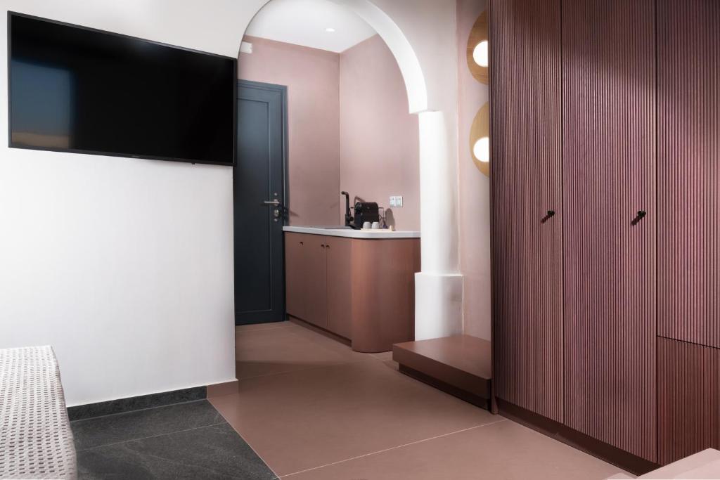 Kuchyň nebo kuchyňský kout v ubytování Callisti Suites
