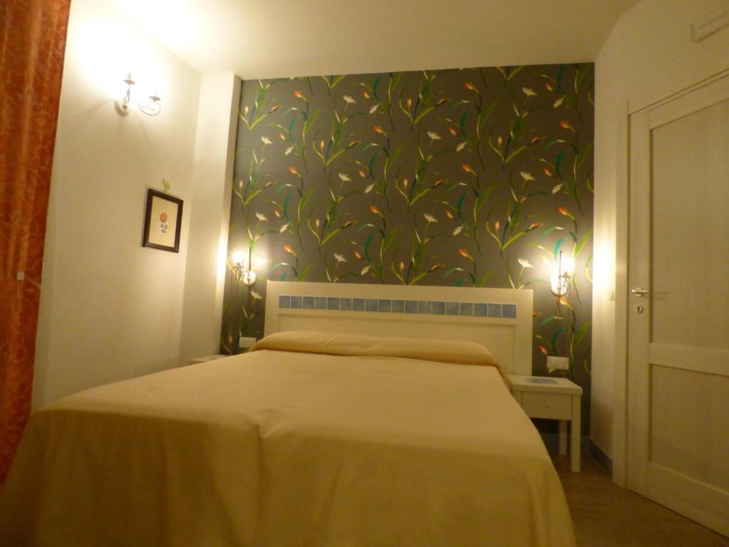Posteľ alebo postele v izbe v ubytovaní Aramoni B&B