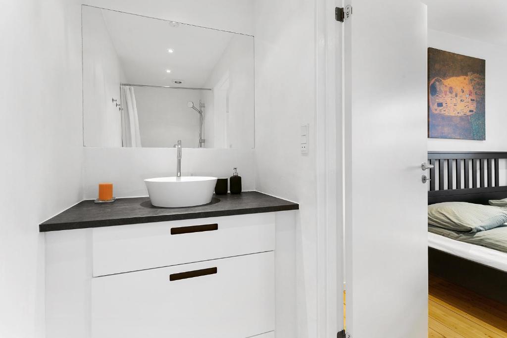 Postel nebo postele na pokoji v ubytování aday - Apartment suite Aalborg Center