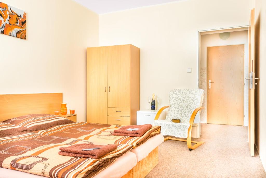 Postel nebo postele na pokoji v ubytování Hotel Zannam