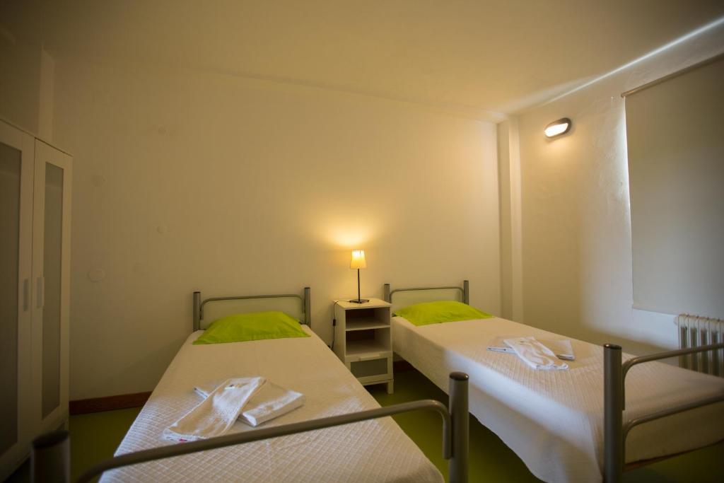 Postel nebo postele na pokoji v ubytování HI Castelo Branco - Pousada de Juventude
