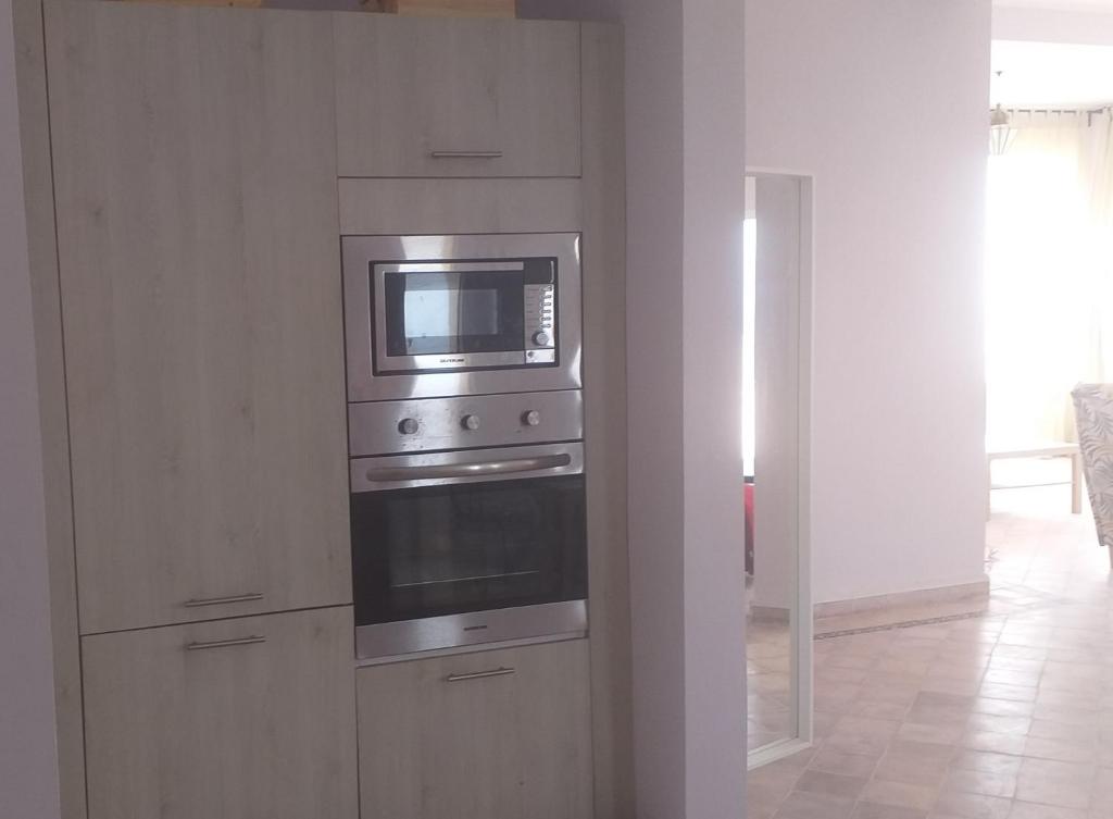 Kuchyň nebo kuchyňský kout v ubytování La Casita