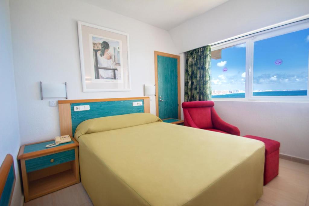 Postel nebo postele na pokoji v ubytování Hotel Servigroup Galua