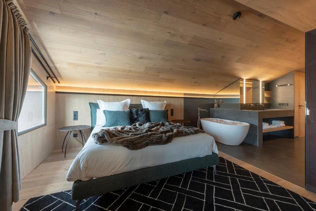 Postel nebo postele na pokoji v ubytování Hotel Naudi Boutique Adults only