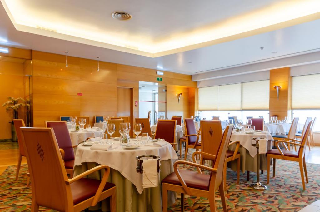 Uma área de estar em Hotel Roma