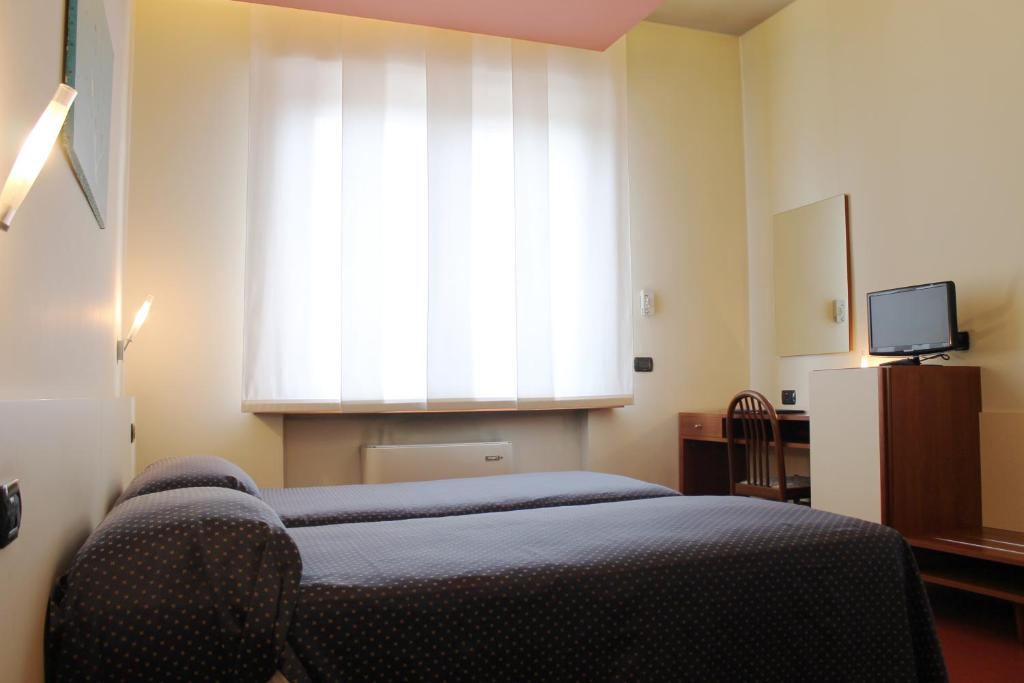 TV a/nebo společenská místnost v ubytování HOTEL OASI