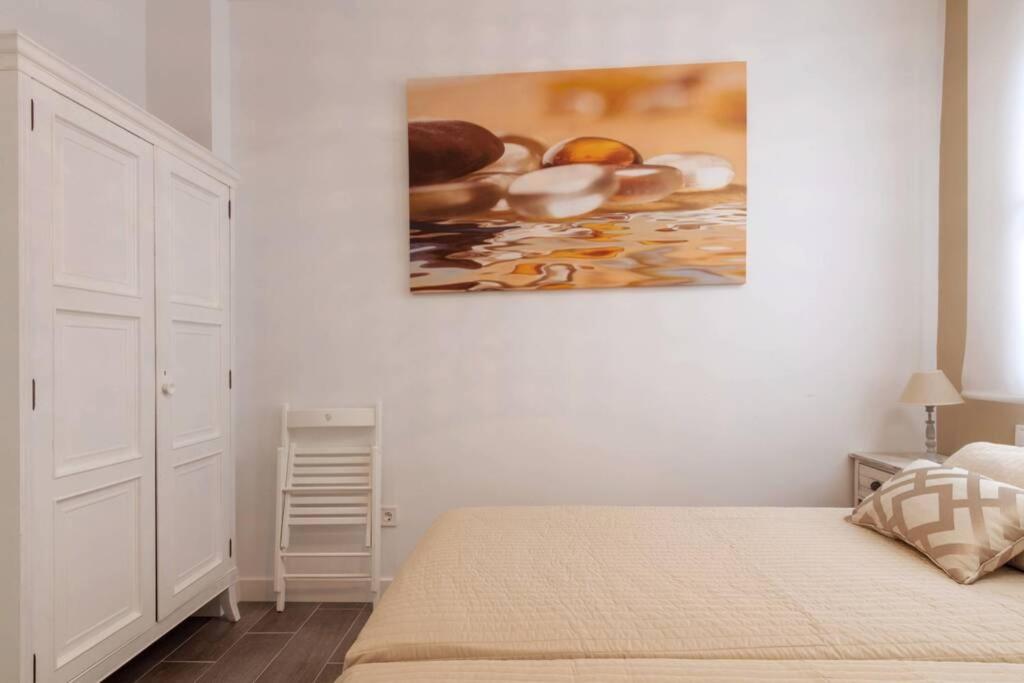 Postel nebo postele na pokoji v ubytování Sensacional Apartamento Junto a Palacio Real by Batuecas