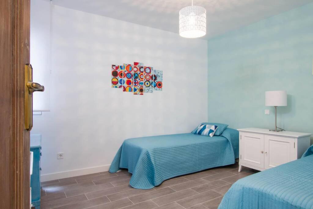 Postel nebo postele na pokoji v ubytování Sensacional Apartamento Junto a Palacio Real by Batuecas