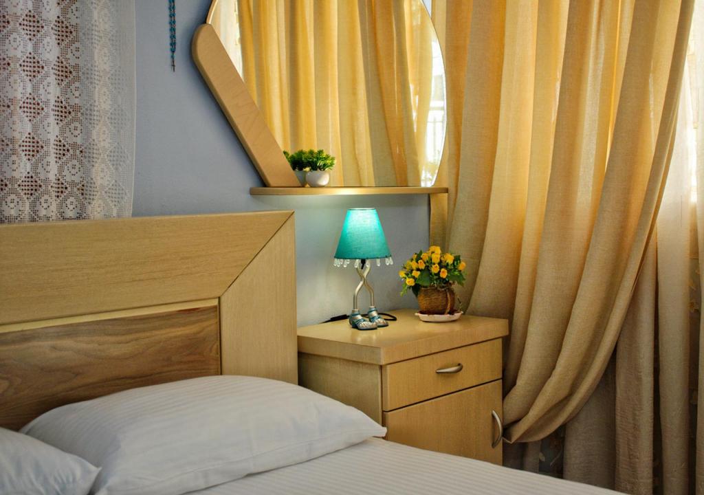 Postel nebo postele na pokoji v ubytování Studios and Apartments Meri